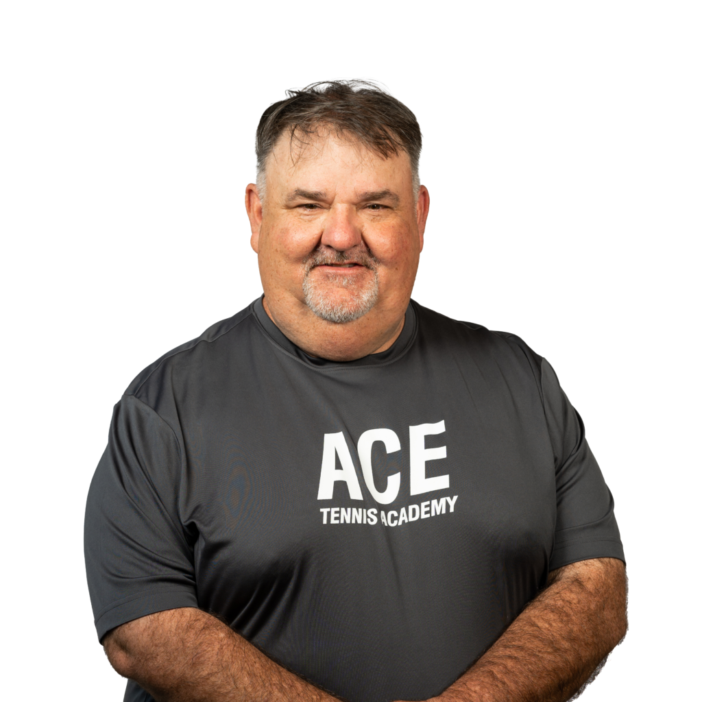 headshot of ace tennis coach charlie zeigler